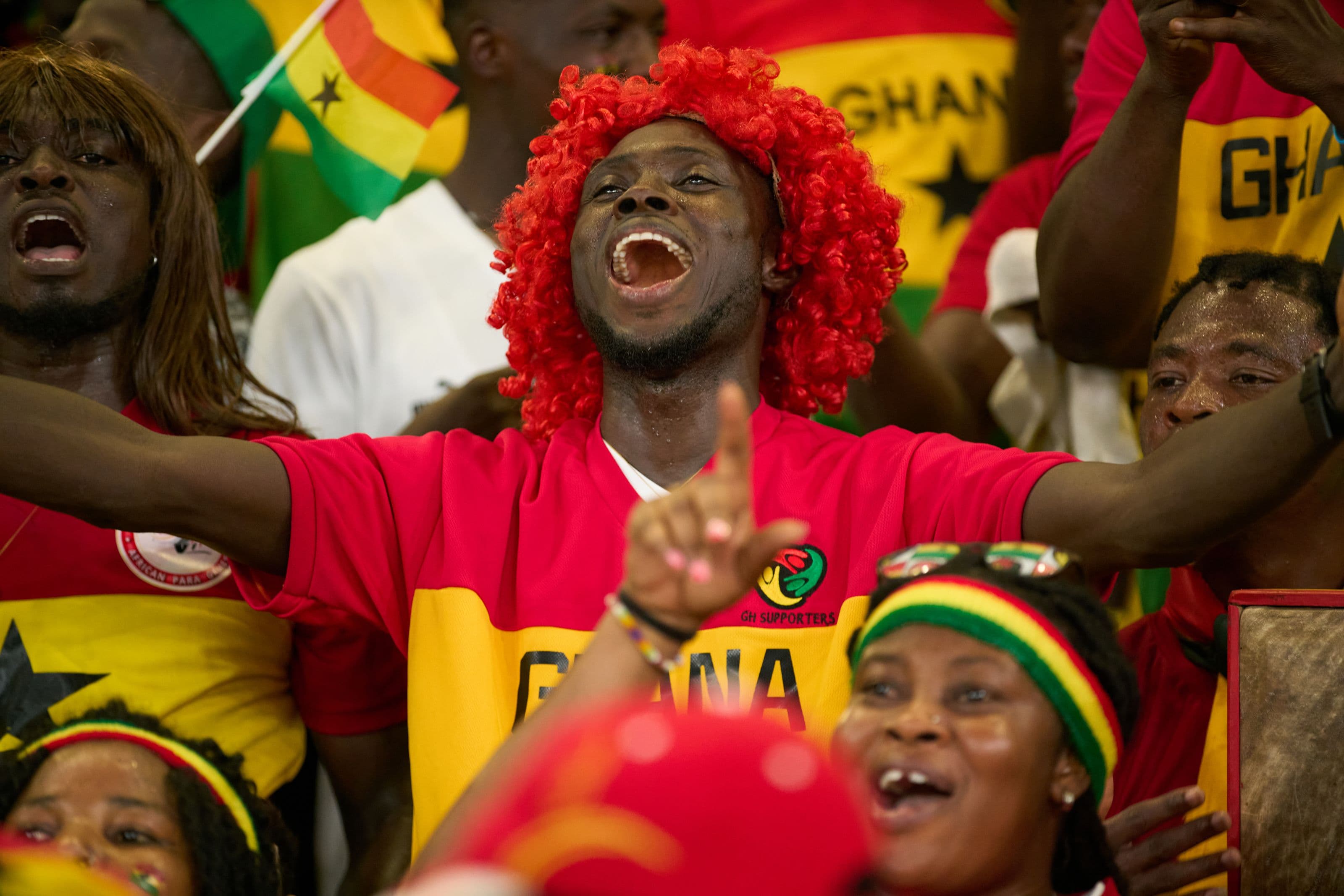 Football fans roaring during a match